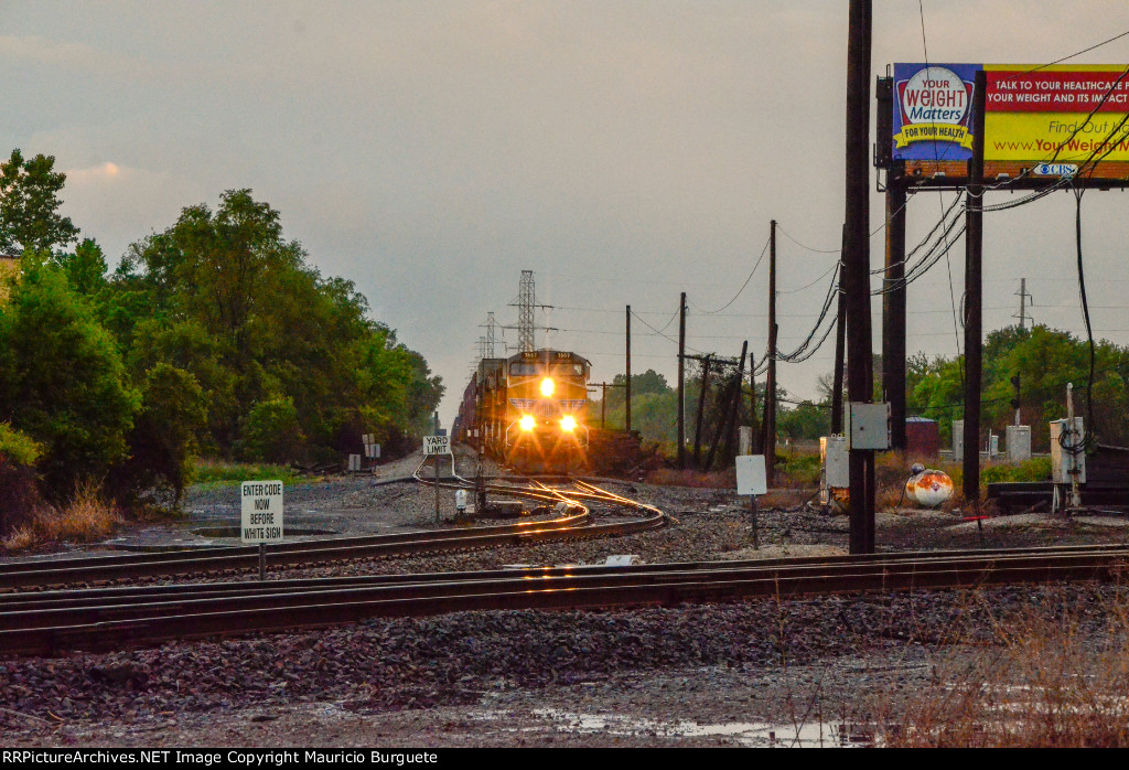 UP AC45CCTE locomotive leading a train in the Yard